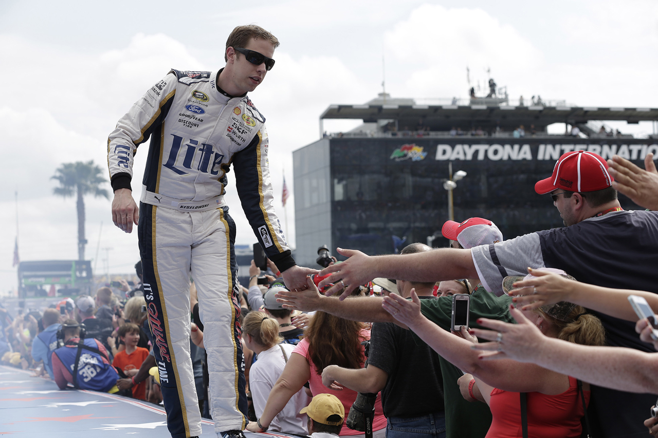 Brad reaches out to greet some fans during pre-race introductions for the Daytona 500.