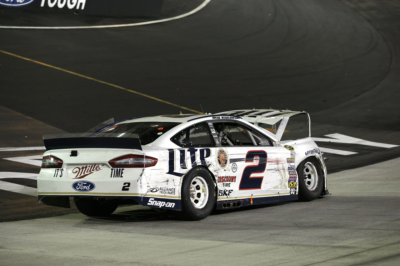 Despite involvement in a late race wreck, Brad Keselowski salvaged a 14th place finish at Bristol and took the points lead.